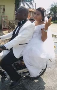 Nigerian couple ride bike home after their wedding in Port Harcourt 
