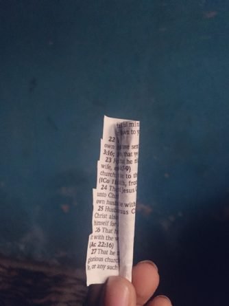 Nigerian lady uses bible as weed wrap