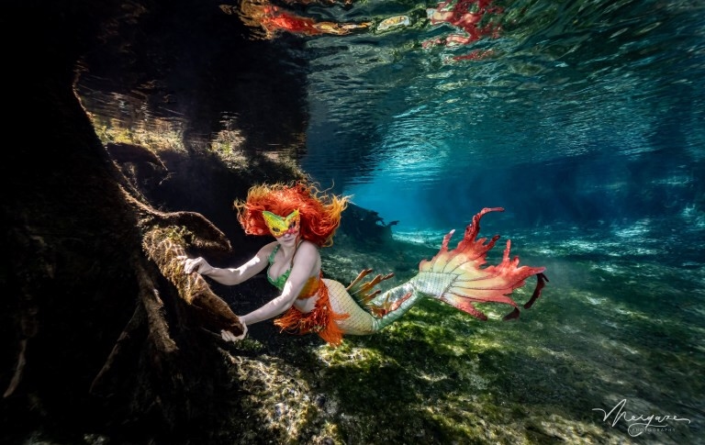 Student spends $3,000 to become real-life mermaid after being inspired by childhood meeting with Disney princess Ariel (photos